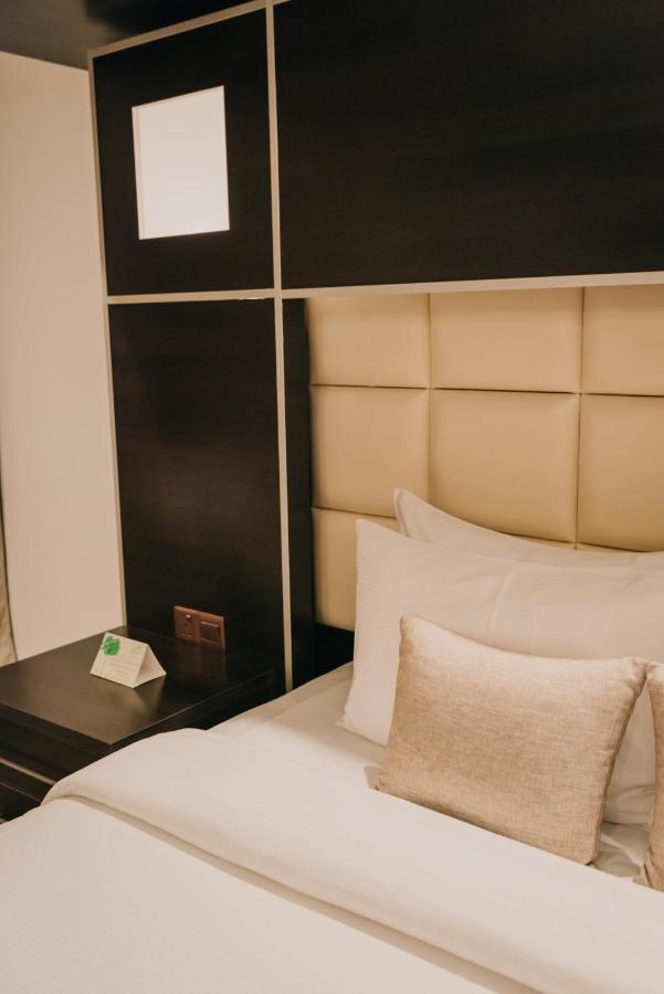 Ashur Hotel Dukhan Buitenkant foto